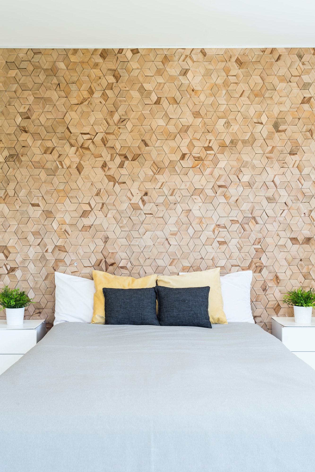 Scandynacian style cork wall in bedroom